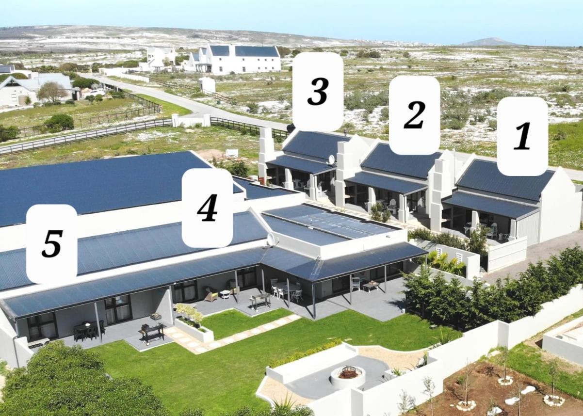 לאנגבאן Three Feathers Cottages מראה חיצוני תמונה
