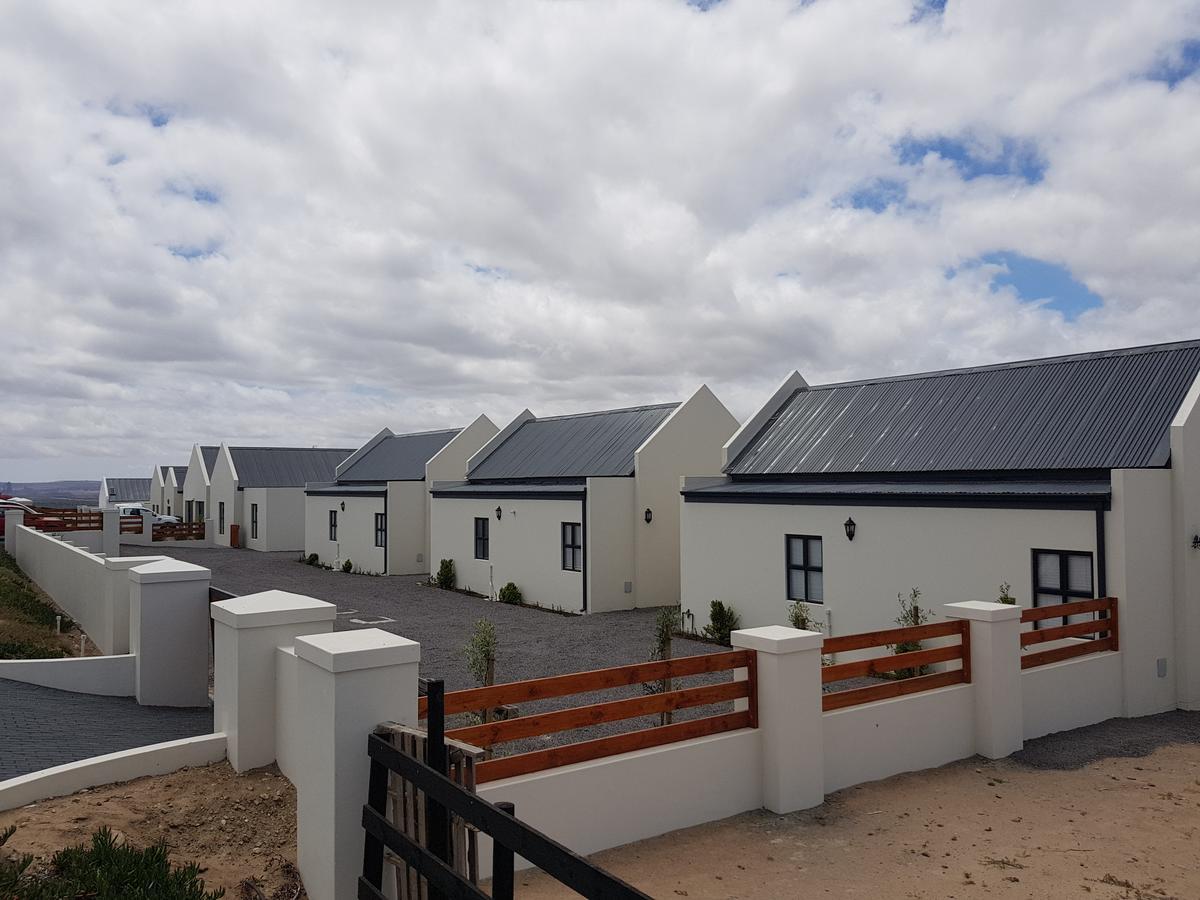 לאנגבאן Three Feathers Cottages מראה חיצוני תמונה