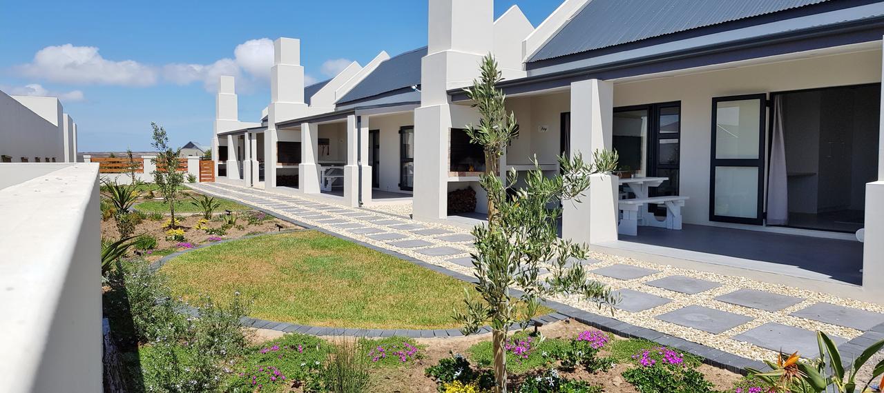 לאנגבאן Three Feathers Cottages מראה חיצוני תמונה