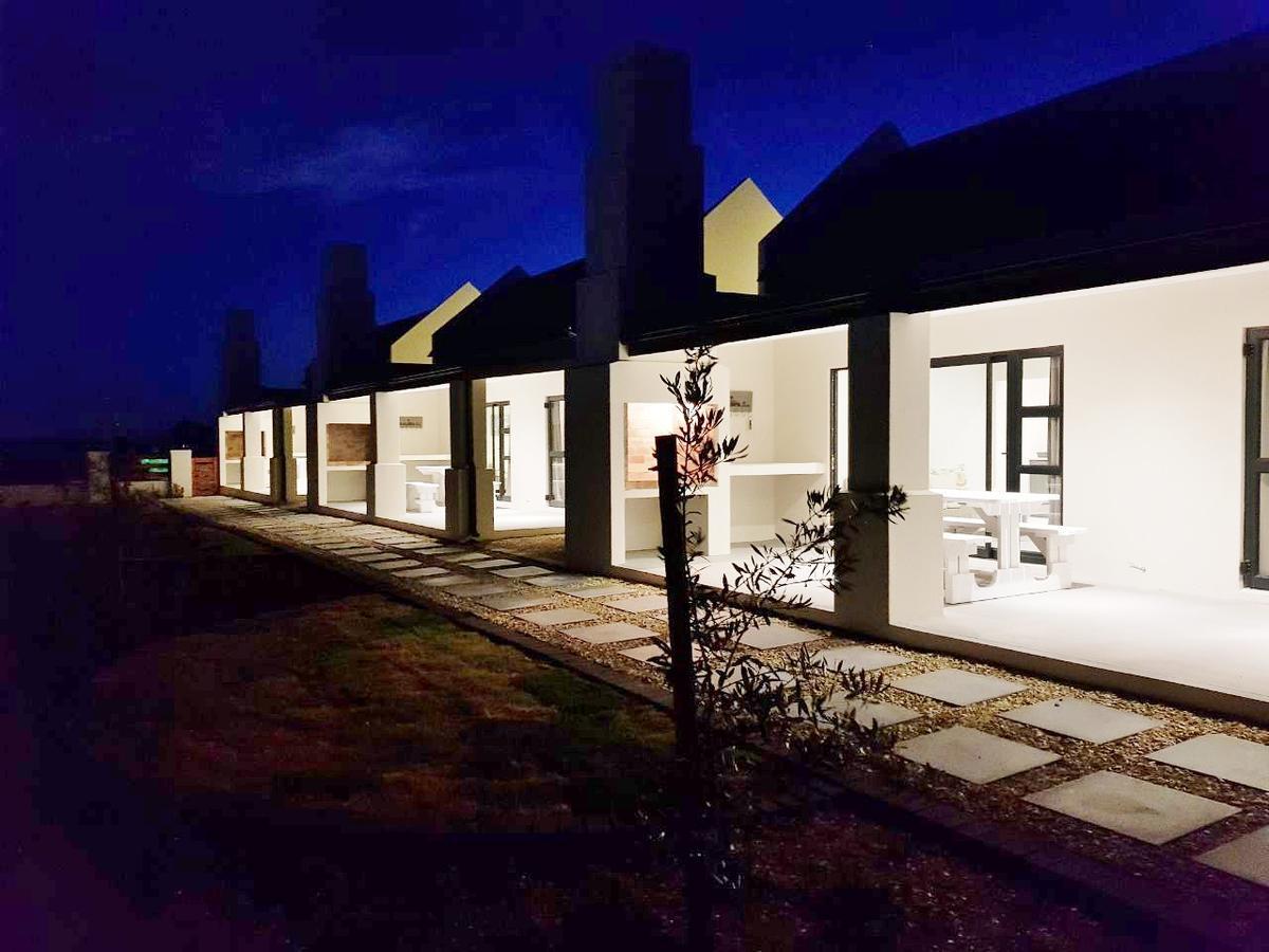 לאנגבאן Three Feathers Cottages מראה חיצוני תמונה