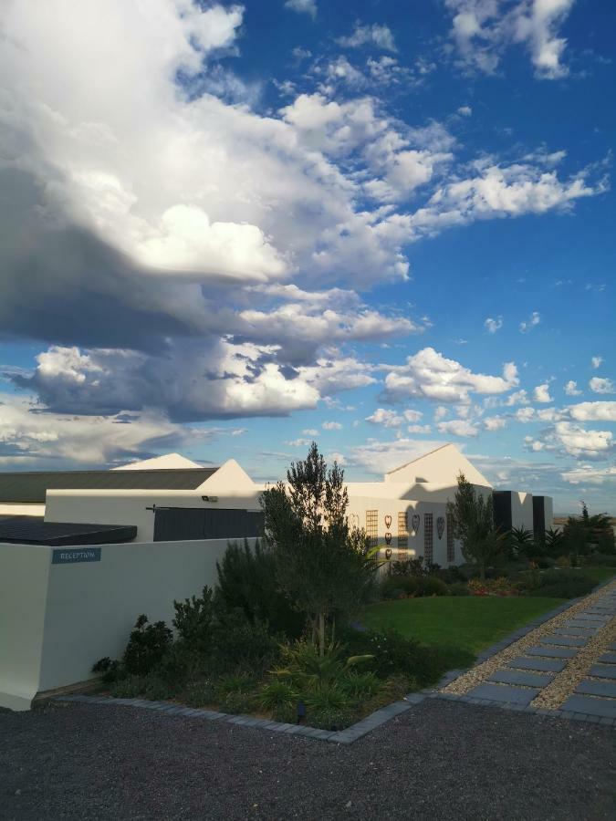 לאנגבאן Three Feathers Cottages מראה חיצוני תמונה